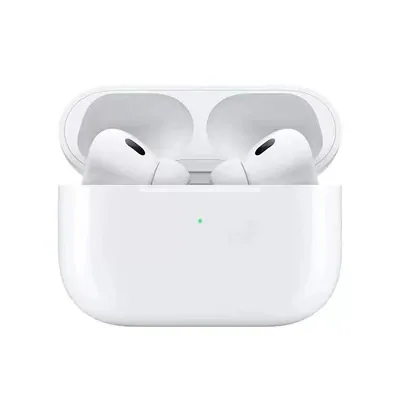 White wireless earbuds sitting in an open charging case