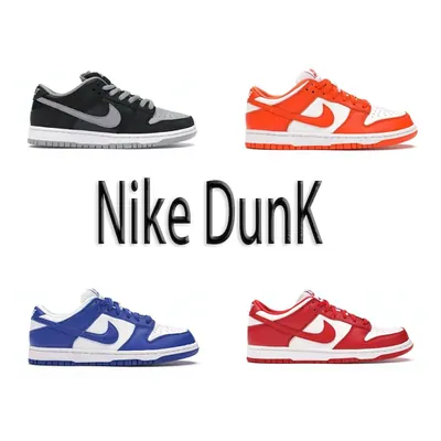 Four Nike Dunk low-tops in grey, orange, blue and red colourways